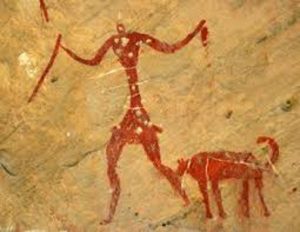 Early European cave painting showing dog  and human